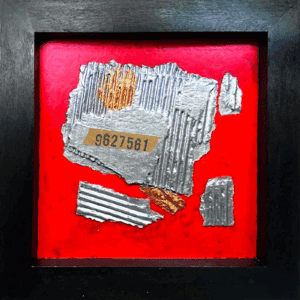 Abstract artwork featuring torn paper and ticket pieces on a red background.