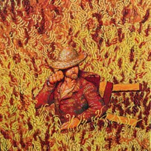 Man in field of swirling yellow patterns.