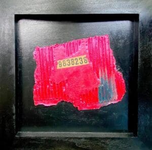Abstract artwork with pink and gray paint on a black background.