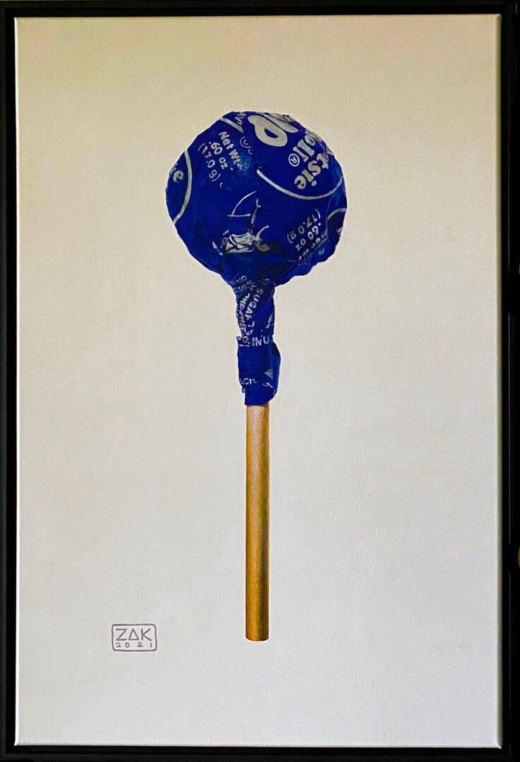 A blue baseball with signatures on a stick against a plain background.