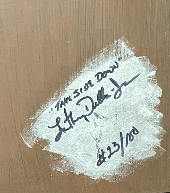 Autograph on a white painted surface with a date.