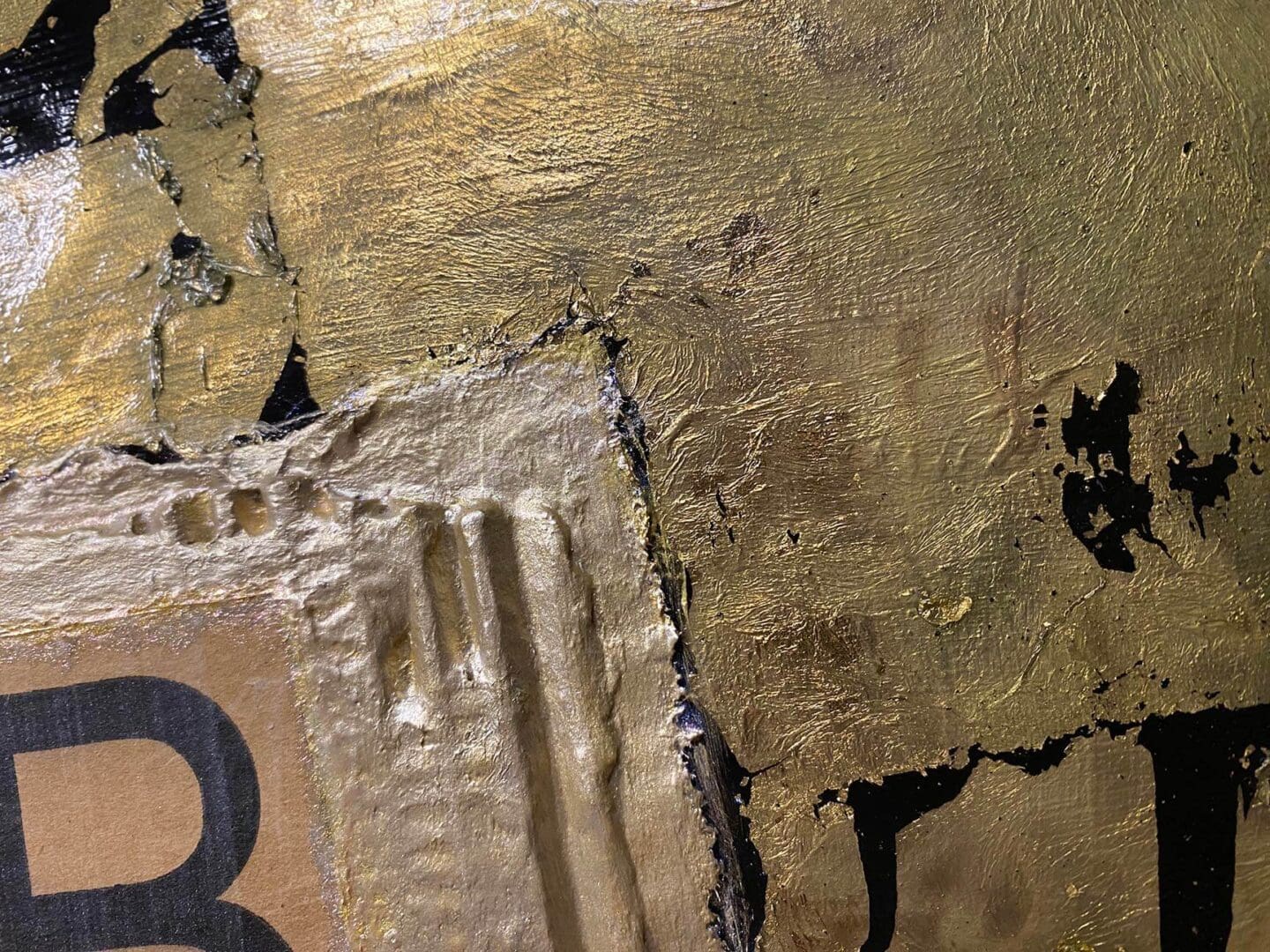 Close-up of aged, peeling cardboard with a printed number.