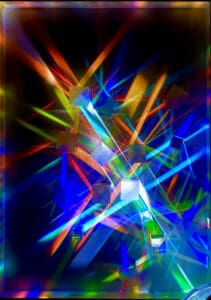 Vibrant multicolored light beams intersecting dynamically.