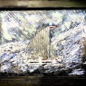 A snowy scene with a rustic wooden shed and a red flag on top.