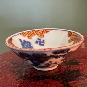 Blue-and-white Chinese porcelain bowl with gilt rim