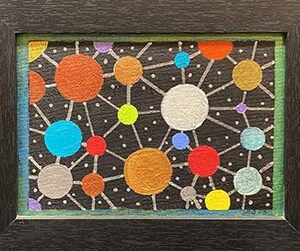 Framed abstract painting of connected colorful circles